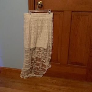 White skirt short in the front long in the back